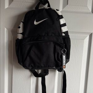 Nike Black and White Swoosh Backpack with 'Just Do It' Keytag